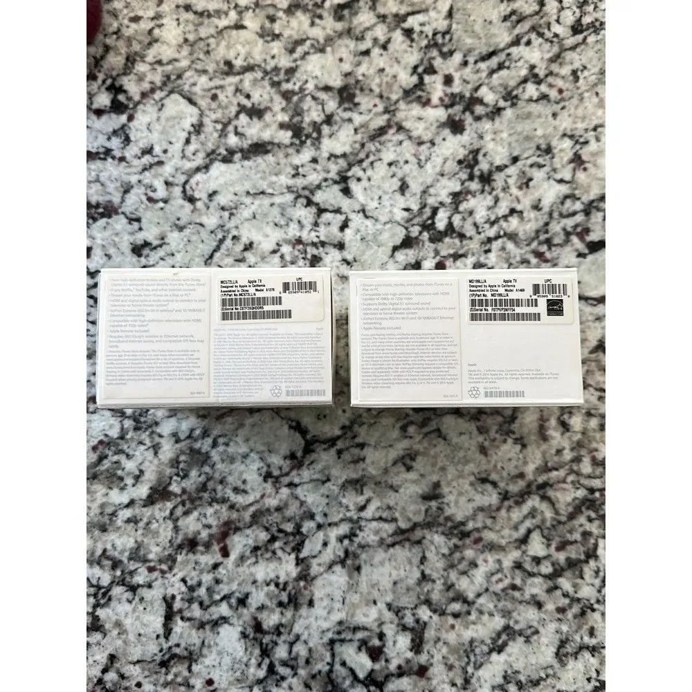 2 empty Apple TV boxes no Apple TV included